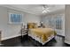 Bedroom features yellow accents and a walkout balcony at 1126 Trailwood Dr, Raleigh, NC 27606