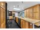 Spacious kitchen with stainless steel appliances, granite countertops, and abundant cabinet space at 1126 Trailwood Dr, Raleigh, NC 27606