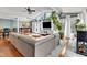 Comfortable living room with modern furniture and a view to the yard at 1126 Trailwood Dr, Raleigh, NC 27606