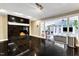 Bright living room with fireplace that opens into the modern kitchen at 1126 Trailwood Dr, Raleigh, NC 27606