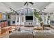 Spacious living room with a large window overlooking the back yard at 1126 Trailwood Dr, Raleigh, NC 27606