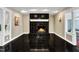 Living room with fireplace and dark tiled floors at 1126 Trailwood Dr, Raleigh, NC 27606