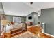 Stylish main bedroom with a decorative bed, hardwood floors, and a wall-mounted television at 1126 Trailwood Dr, Raleigh, NC 27606