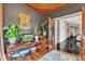 Inviting home office featuring hardwood floors, custom trim, and natural light at 1126 Trailwood Dr, Raleigh, NC 27606