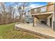 Spacious stamped concrete patio with outdoor seating and covered grilling area, perfect for entertaining at 1126 Trailwood Dr, Raleigh, NC 27606