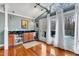 Serving bar located inside the living room with access to the deck at 1126 Trailwood Dr, Raleigh, NC 27606