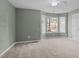 Spacious bedroom with bay window and neutral carpeting at 1322 Cedar Branch Ct, Wake Forest, NC 27587