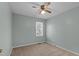 Simple bedroom with ceiling fan and window at 1322 Cedar Branch Ct, Wake Forest, NC 27587
