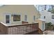 Home exterior featuring a deck and storage shed at 1322 Cedar Branch Ct, Wake Forest, NC 27587