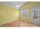 Bright dining area with hardwood floors and access to deck at 1322 Cedar Branch Ct, Wake Forest, NC 27587
