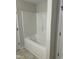 Bathroom with a new tub and shower combination at 233 N Movado Trl, Kenly, NC 27542