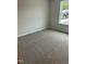 Bedroom featuring new carpet, a window, and a view at 233 N Movado Trl, Kenly, NC 27542