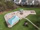 Aerial view of the community playground with green space and lots of play structures at 2332 Turtle Point Dr, Raleigh, NC 27604