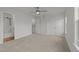 Bedroom featuring soft carpet, ceiling fan and access to the bathroom at 2332 Turtle Point Dr, Raleigh, NC 27604
