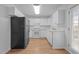 Functional kitchen featuring white cabinets and modern appliances, ideal for cooking and entertaining at 2332 Turtle Point Dr, Raleigh, NC 27604