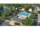 Community pool and clubhouse with lounge chairs and parking available for a relaxing afternoon swim at 2332 Turtle Point Dr, Raleigh, NC 27604