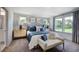 Spacious main bedroom with large windows, neutral decor and an en-suite bathroom at 257 Hank Way, Angier, NC 27501