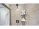 Close-up view of a clean shower with corner shelves at 257 Hank Way, Angier, NC 27501
