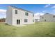 New home with grassy backyard and a patio at 264 Hawksmoore Ln, Lillington, NC 27546