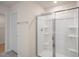Shower with glass enclosure and built in shelving at 264 Hawksmoore Ln, Lillington, NC 27546