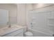Clean bathroom with tub shower and updated vanity at 264 Hawksmoore Ln, Lillington, NC 27546