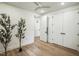 Light-filled bedroom with hardwood floors and double doors at 29 Enterprise St # 108, Raleigh, NC 27607