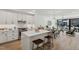 Modern kitchen with island and stainless steel appliances at 29 Enterprise St # 108, Raleigh, NC 27607