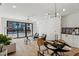 Living room with hardwood floors and sliding glass doors at 29 Enterprise St # 108, Raleigh, NC 27607