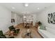 Open concept living area with view into the bedroom at 29 Enterprise St # 108, Raleigh, NC 27607