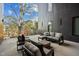 Private balcony offers a serene outdoor space with comfortable seating, perfect for relaxation and enjoying the natural surroundings at 29 Enterprise St # 108, Raleigh, NC 27607