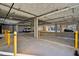 Spacious parking garage with ample parking spots and safety features throughout, providing secure parking for residents at 29 Enterprise St # 108, Raleigh, NC 27607
