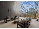 Beautiful patio with modern outdoor furniture and a lovely view of the neighborhood at 29 Enterprise St # 108, Raleigh, NC 27607
