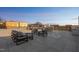 Relaxing rooftop deck features stylish outdoor furniture with sunset views, offering the perfect space to unwind and socialize at 29 Enterprise St # 108, Raleigh, NC 27607