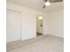 Main bedroom with carpet, ceiling fan and ensuite bath at 3050 Bennett Siler City Rd, Bennett, NC 27208