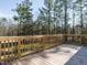 Wooden deck overlooks a wooded area at 3050 Bennett Siler City Rd, Bennett, NC 27208