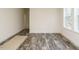 Bright dining area with wood-look floors and large windows at 3050 Bennett Siler City Rd, Bennett, NC 27208