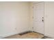 Simple entryway with a carpeted floor and a door at 3050 Bennett Siler City Rd, Bennett, NC 27208