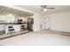 Open kitchen with white cabinets and an island at 3050 Bennett Siler City Rd, Bennett, NC 27208