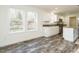 Modern kitchen featuring white cabinets and granite countertops at 3050 Bennett Siler City Rd, Bennett, NC 27208