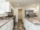 Modern kitchen with white cabinets and pantry at 3050 Bennett Siler City Rd, Bennett, NC 27208