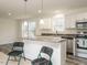 Modern kitchen with stainless steel appliances and island at 3050 Bennett Siler City Rd, Bennett, NC 27208