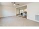 Open concept living room and kitchen area with a ceiling fan at 3050 Bennett Siler City Rd, Bennett, NC 27208