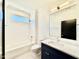 Charming bathroom with subway tile, large mirror, and stylish vanity at 3315 Hampton Rd, Raleigh, NC 27607