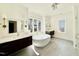 Bathroom featuring dual vanities, a soaking tub, and sleek fixtures at 3315 Hampton Rd, Raleigh, NC 27607