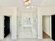 This gorgeous bathroom features a glass shower and a free standing tub at 3315 Hampton Rd, Raleigh, NC 27607