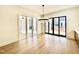 Dining room with sliding doors leading to an outdoor patio, and stylish pendant lighting fixture at 3315 Hampton Rd, Raleigh, NC 27607
