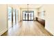Dining room with a modern chandelier, built-in buffet, and sliding glass doors to the backyard at 3315 Hampton Rd, Raleigh, NC 27607