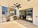 Covered patio features an outdoor kitchen with stainless steel grill and stone floors at 3315 Hampton Rd, Raleigh, NC 27607