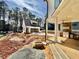 Covered patio features an outdoor kitchen area with a stainless steel grill at 3315 Hampton Rd, Raleigh, NC 27607