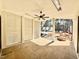 Covered patio features stone floors, a ceiling fan, and outdoor lighting at 3315 Hampton Rd, Raleigh, NC 27607